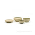 Reactive glazed stoneware dinner set in light brown